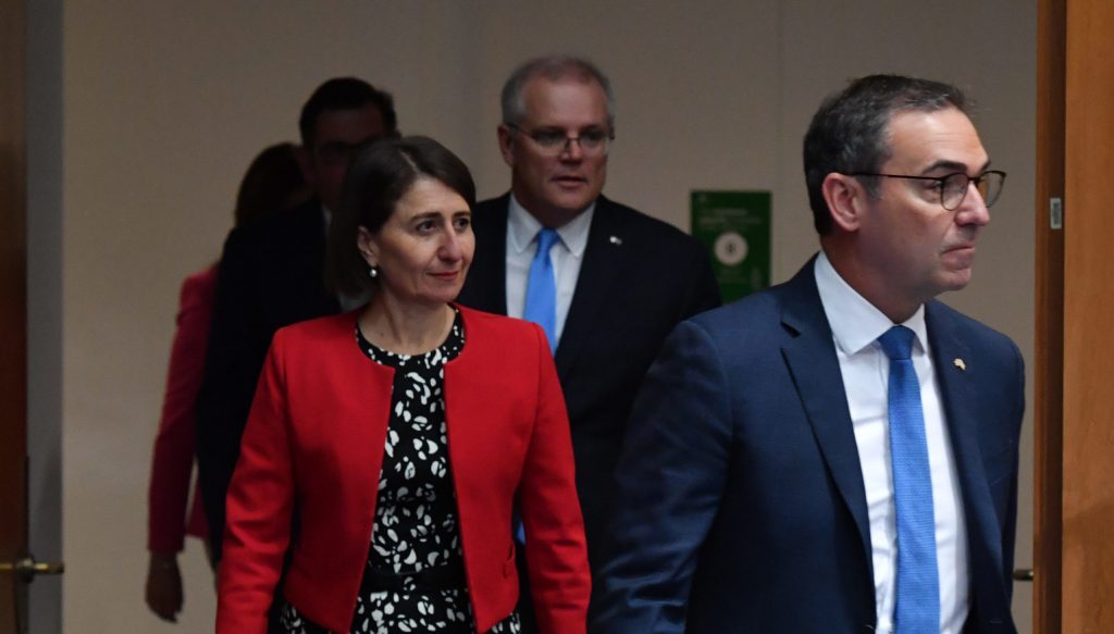 Steven Marshall leads Gladys Berejiklian and Scott Morrison into a media conference after national cabinet met last year. Photo: Mick Tsikas / AAP