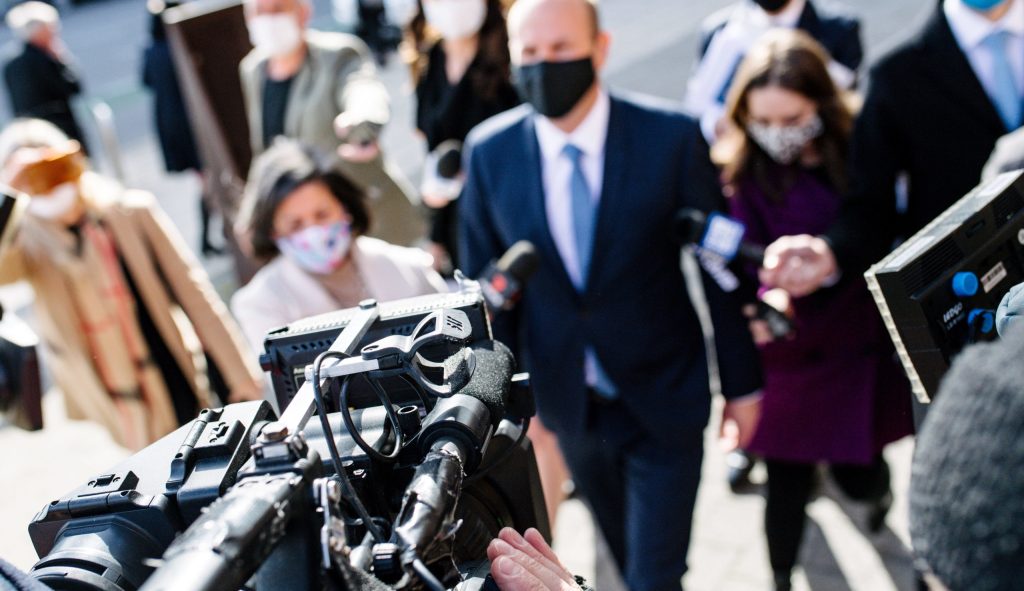 Sam Duluk leaving court last month, surrounded by media. Photo: Morgan Sette / AAP