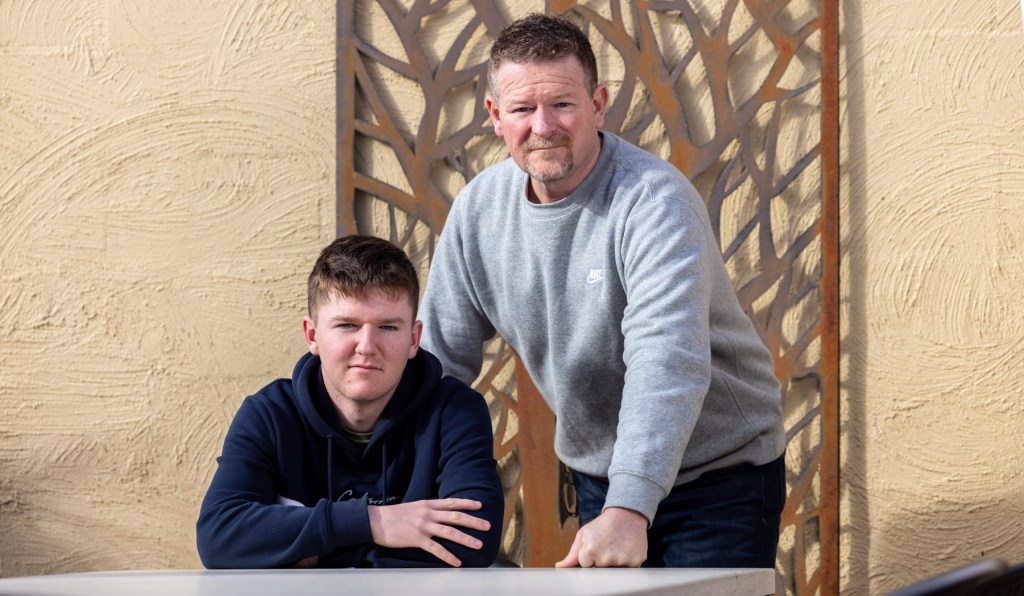 16-year-old Harvey Cox, with his dad, Ben Cox, who have spent months trying to get accurate answers about TAFE fees.
Photo: Tony Lewis/InDaily