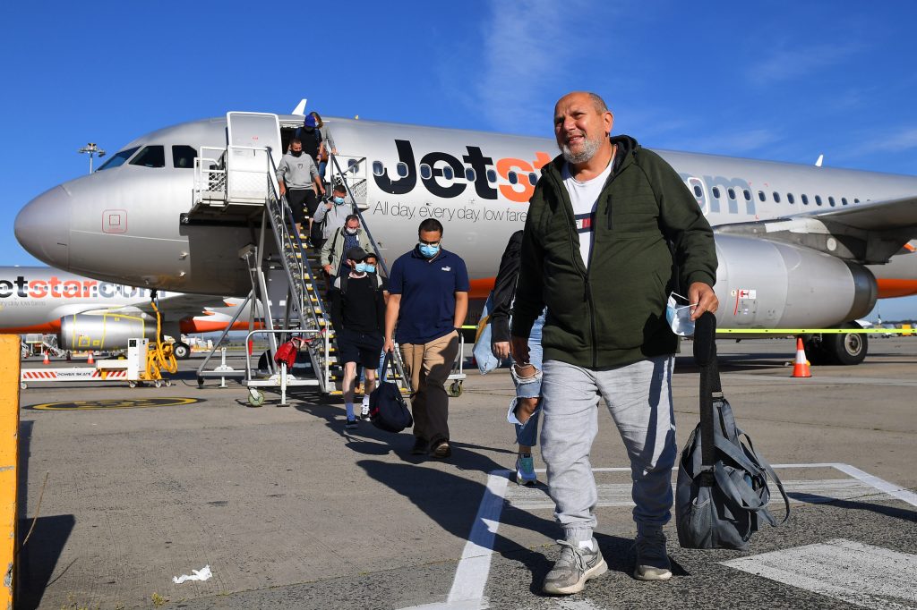 An interstate flight from Sydney lands in Melbourne today. Photo: AAP/James Ross