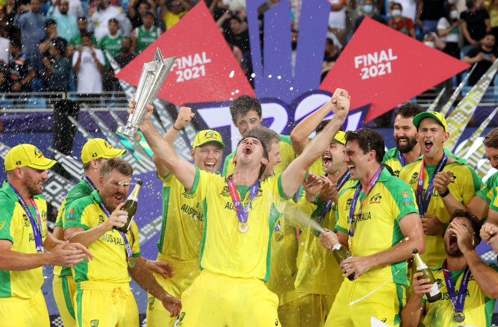 Mitchell Marsh (centre) leads Australian celebrations after the team won the T20 World Cup in Dubai. Photo: AAP/David Gray
