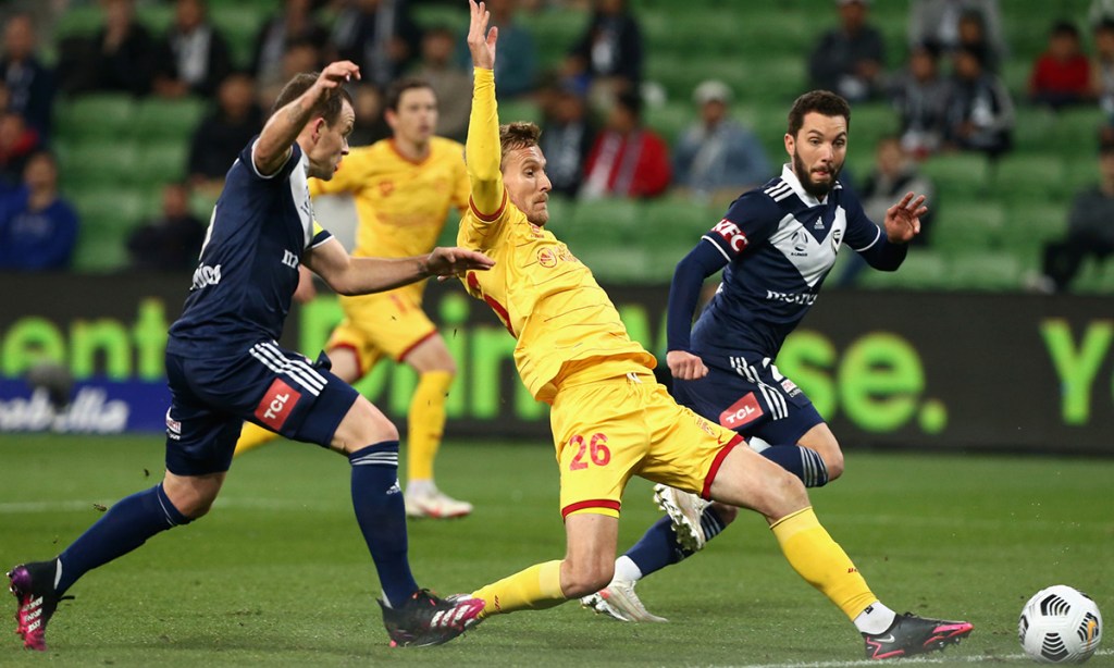 United's Benjamin Halloran attempts a shot for goal during the May clash with Victory in Melbourne. Photo: AAP/Rob Prezioso