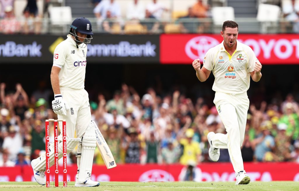 Australia's Josh Hazlewood celebrates the wicket of England captain Joe Root at The Gabba. Photo: Jason O'Brien/PA Wire