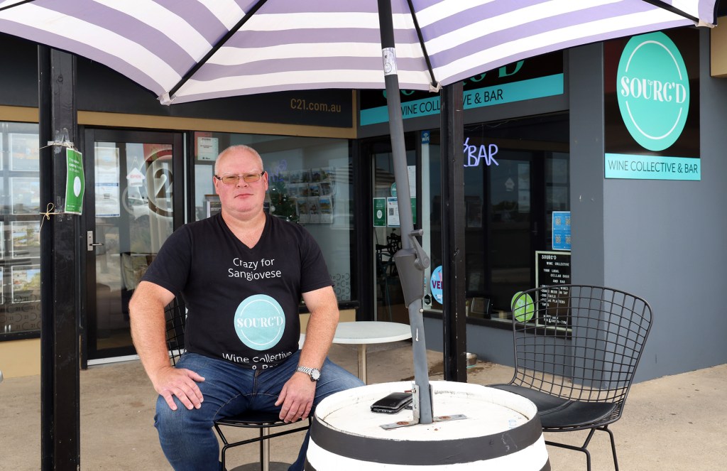 Sourc'd wine bar owner Matt Johnston is concerned he might be forced to check customers' vaccination certificates once SA reaches its 90 per cent vaccination target. Photo: Tony Lewis/InDaily  