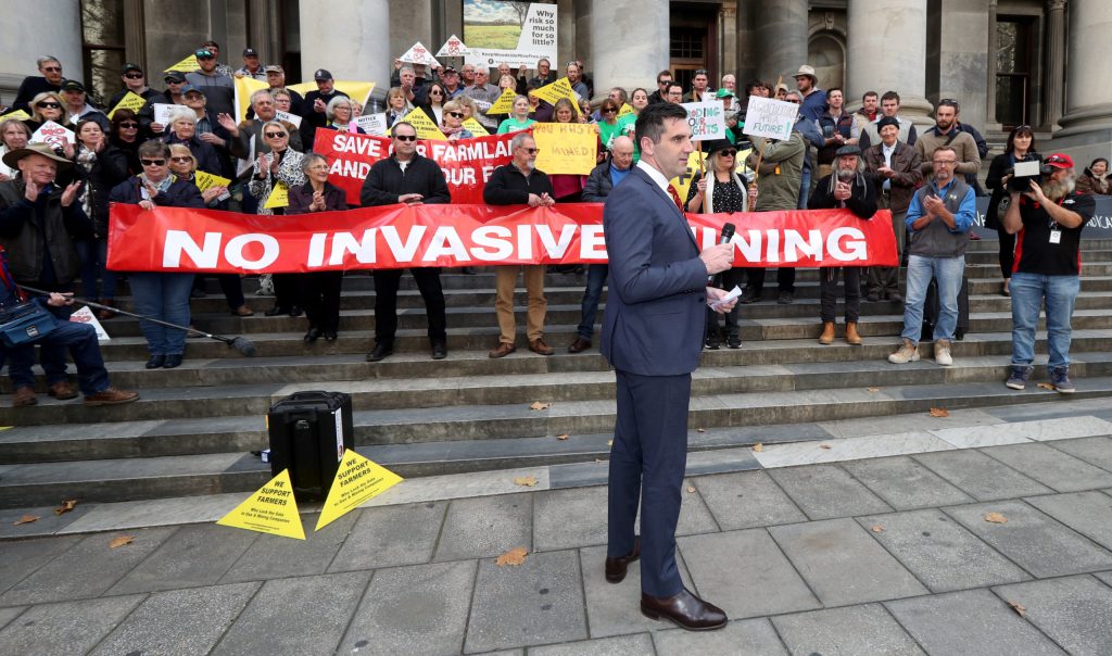 Fraser Ellis with supporters from the farming community outside parliament in 2019. Photo: Kelly Barnes / AAP