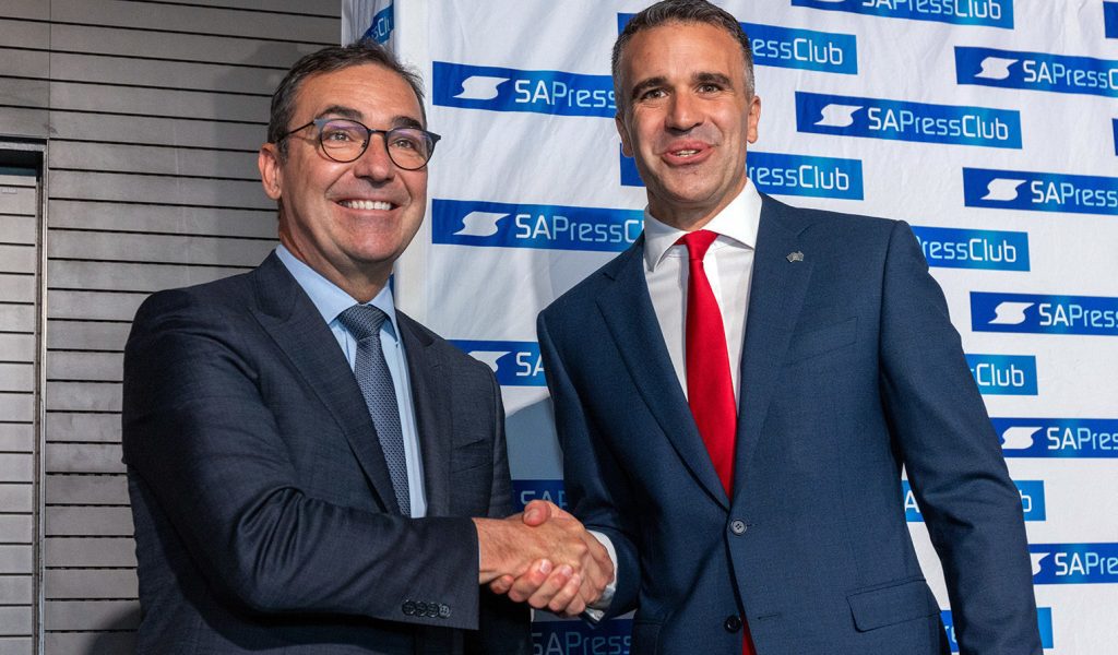 Steven Marshall and Peter Malinauskas at last year's SA Press Club debate: handshakes such as this will be off-limits in the forthcoming campaign. Photo: Tony Lewis / InDaily
