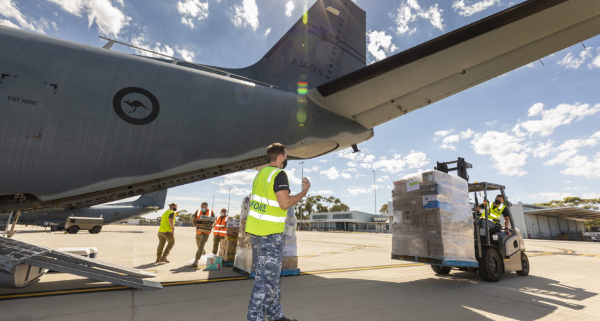 RAAF planes delivered supplies to Coober Pedy after it was cut off by flooding. Photo: AAP/Supplied by Department Of Defence, LAC Stewart Gould