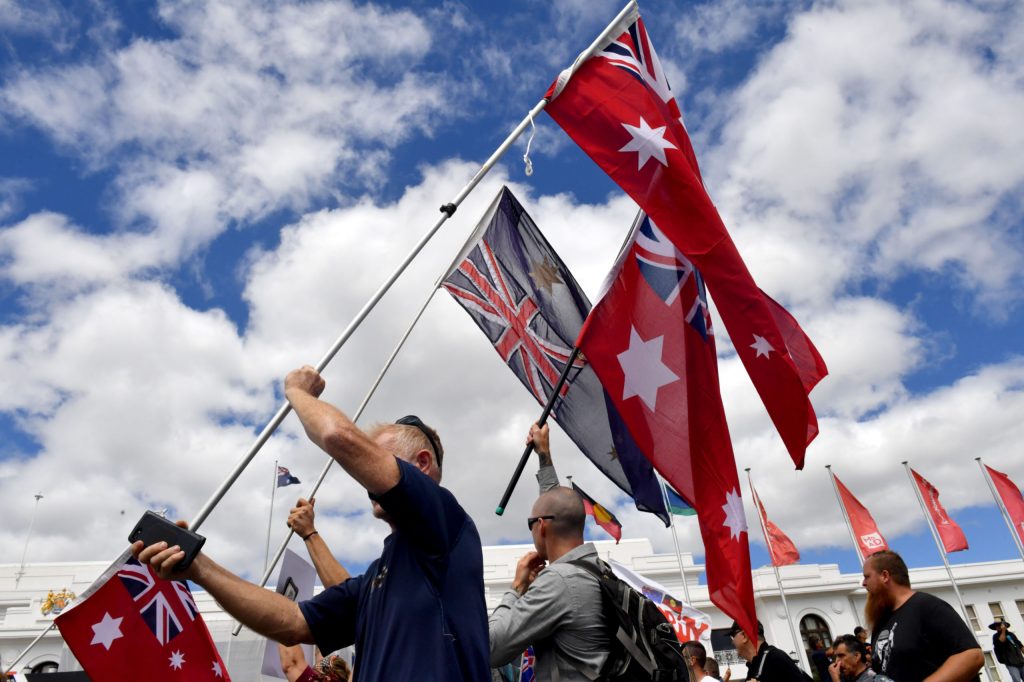 Anti-vaccination protesters outside Old Parliament House on Saturday. A Monday protest has targeted the Governor-General. Photo: AAP/Mick Tsikas