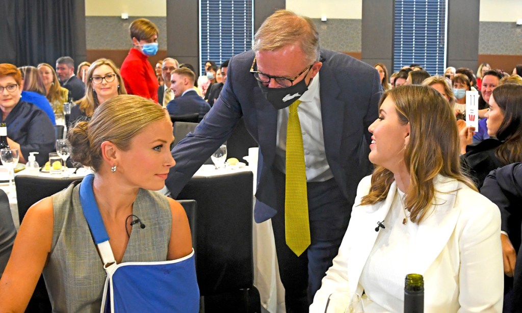 2021 Australian of the Year Grace Tame (left) and advocate for survivors of sexual assault Brittany Higgins with Opposition Leader Anthony Albanese at the Press Club address. Photo: AAP/Lukas Coch