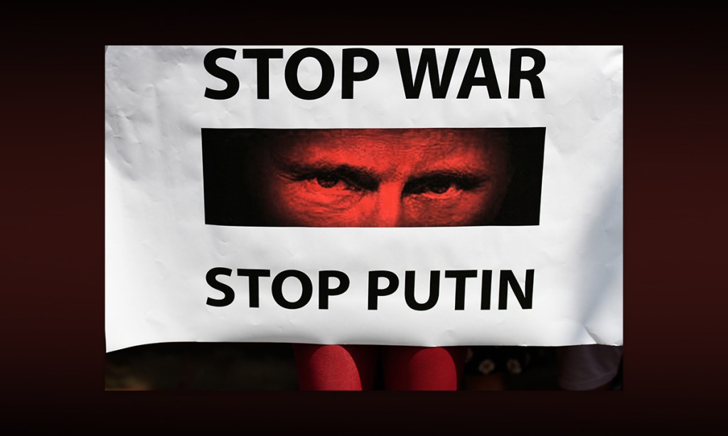 A poster at a protest outside the Russian embassy in Bangkok. Photo: Vichan Poti/Pacific Press/Sipa USA