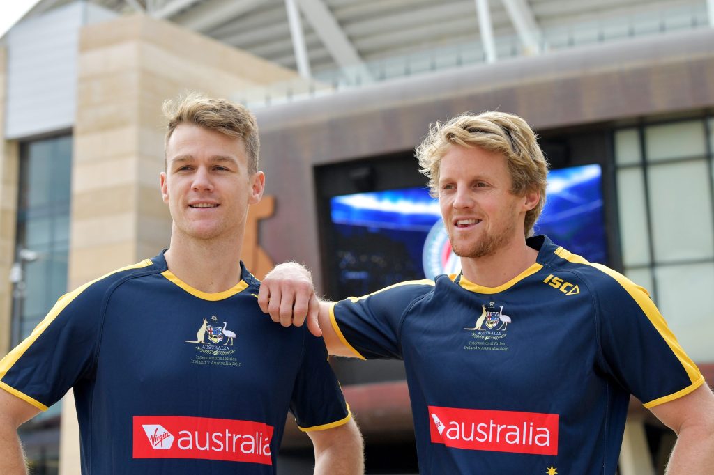 Rory Sloane and Robbie Gray pictured in a 2017 photoshoot ahead of the International Rules series against Ireland.  The duo will miss tonight's AFL Showdown at Adelaide Oval. Photo David Mariuz/AAP 