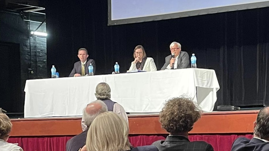 A Liberal delegate confronts the party's leadership on stage (L-R senator Simon Birmingham, state director Sascha Meldrum and president Legh Davis) at last Friday's state council meeting.