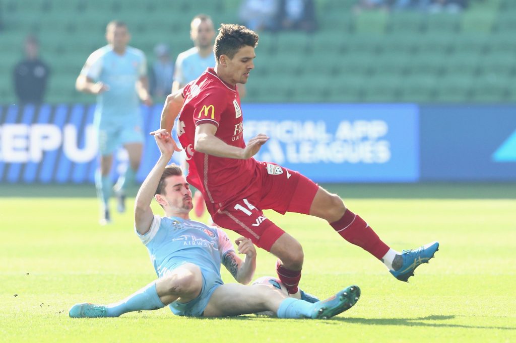 Connor Metcalfe of Melbourne City and United's George Blackwood during the A-League semi-final second leg match in Melbourne. Photo: AAP/Rob Prezioso