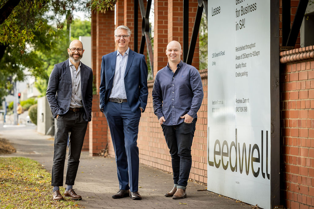 Outgoing Leedwell Property partner John Savva (left) with new equity partners Brad Feast (middle) and Henry Treloar (right). Photo: supplied