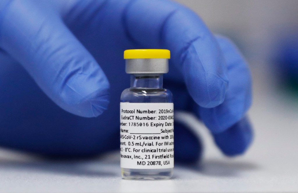 A vial of the Phase 3 Novavax coronavirus vaccine prepared for use in a trial at St. George's University hospital in London. Photo: AP/Alastair Grant