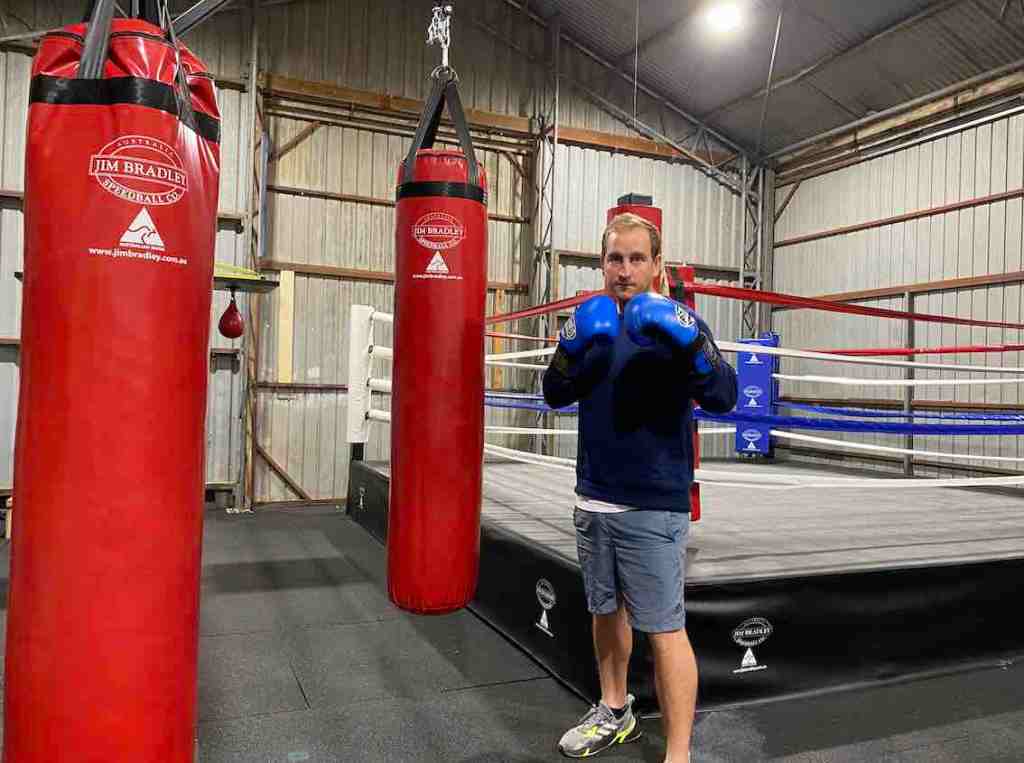 Ken Smoglian in the boxing ring of his Island Fitness gym.