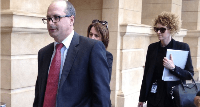Former DPP Adam Kimber (left) when he announced he would leave the role in 2018. Photo courtesy ABC News Adelaide
