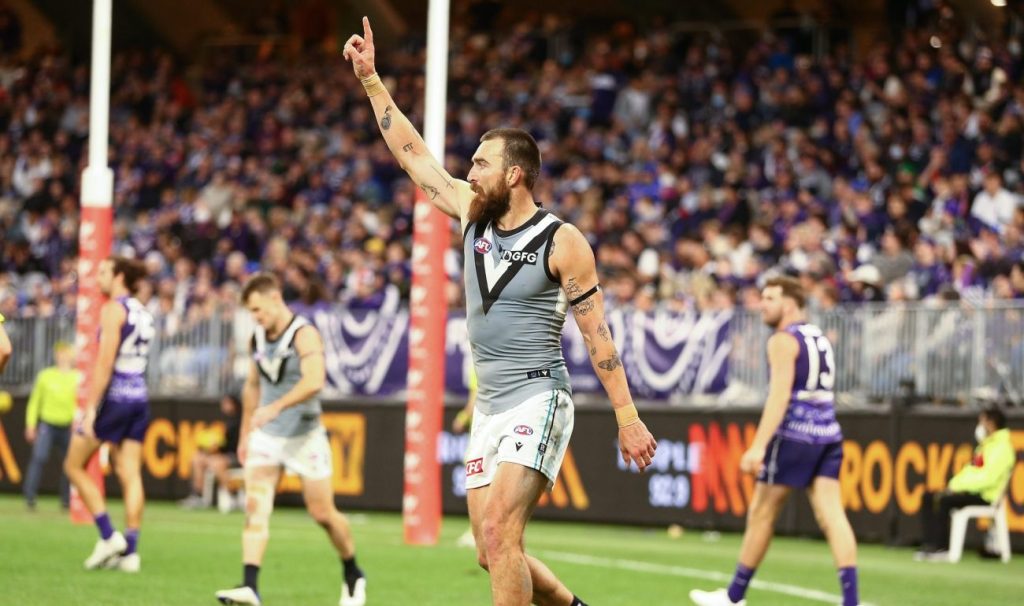 Charlie Dixon celebrates a non-match-winning goal yesterday. Photo: Gary Day / AAP