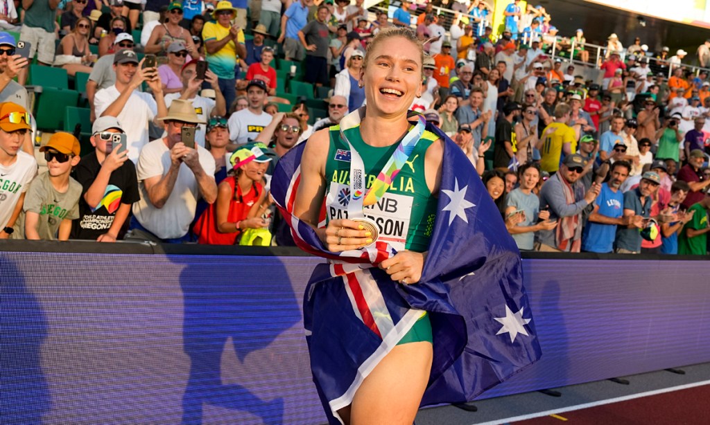 Eleanor Patterson celebrates winning the gold medal in the women's high jump final at the World Athletics Championships on Tuesday. Photo: Charlie Riedel/AP