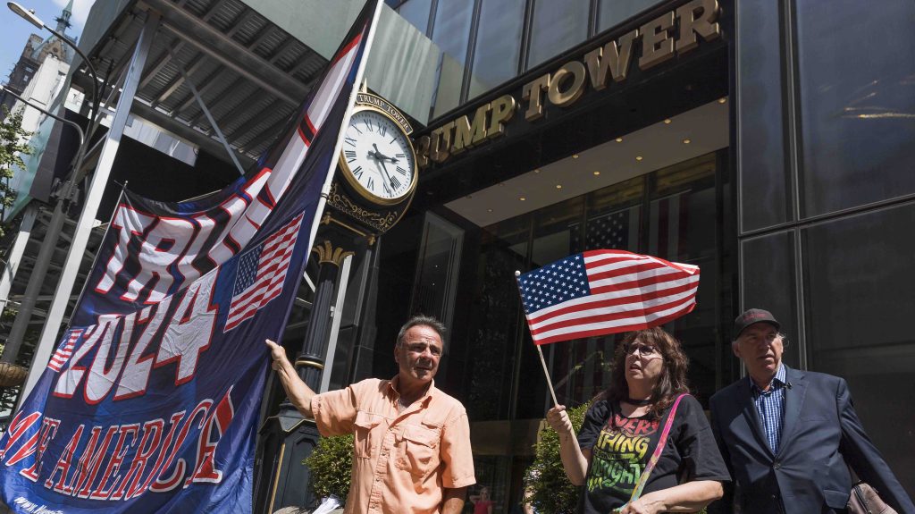Supporters of former US President Donald Trump outside Trump Tower in New York following news of the FBI raid. Photo: EPA/Justin Lane