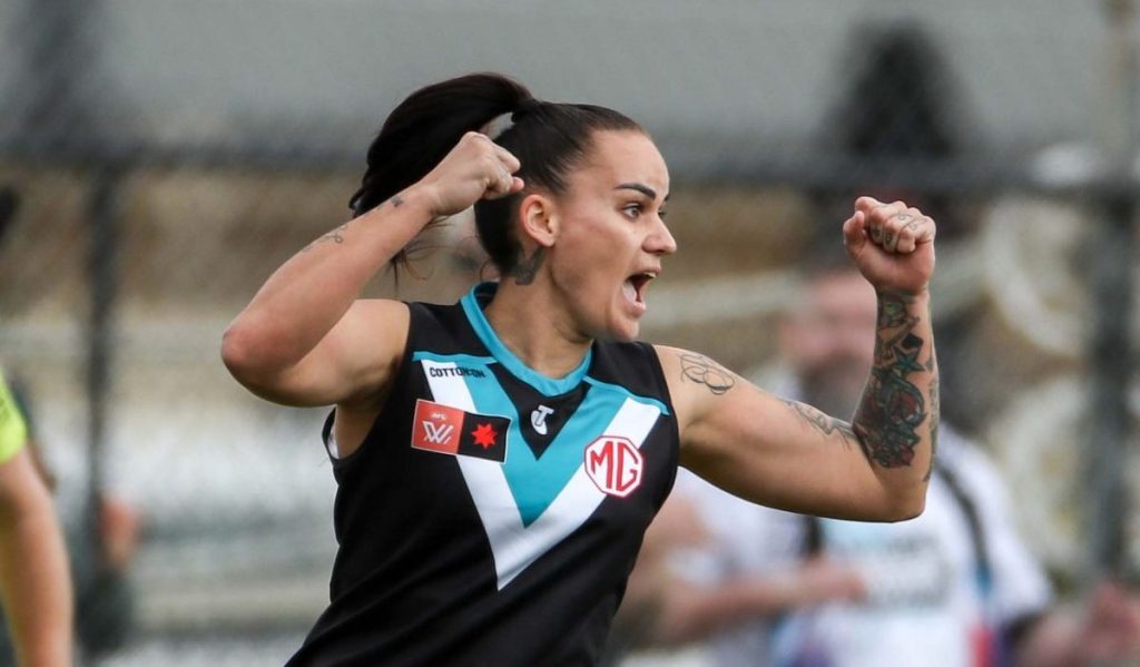 Gemma Houghton celebrates a goal at Alberton Oval on Saturday. Photo: AAP/Matt Turner