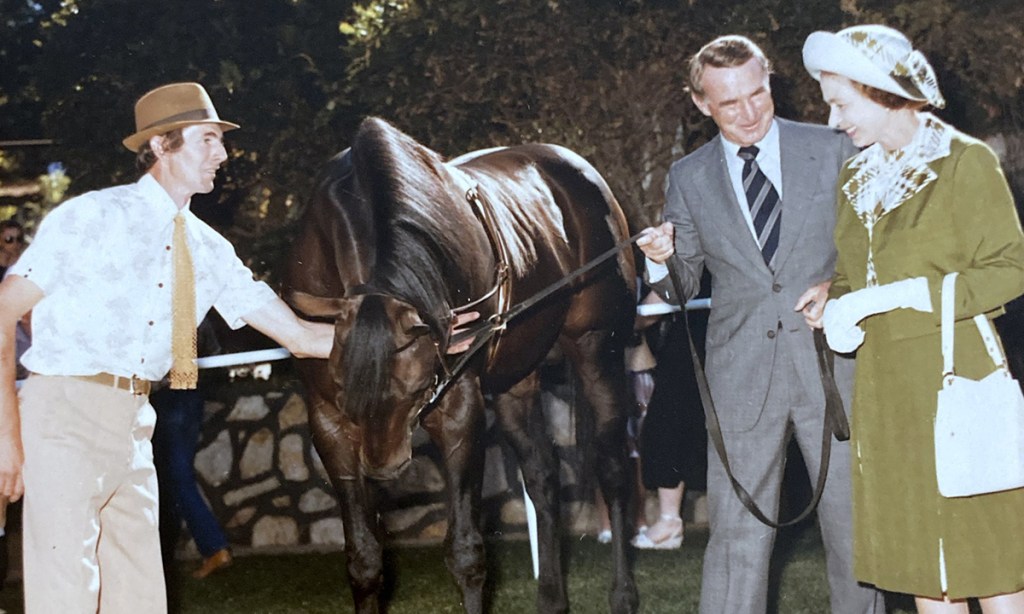 Peter Jones, Colin Hayes and Queen Elizabeth with 'Without Fear'. 