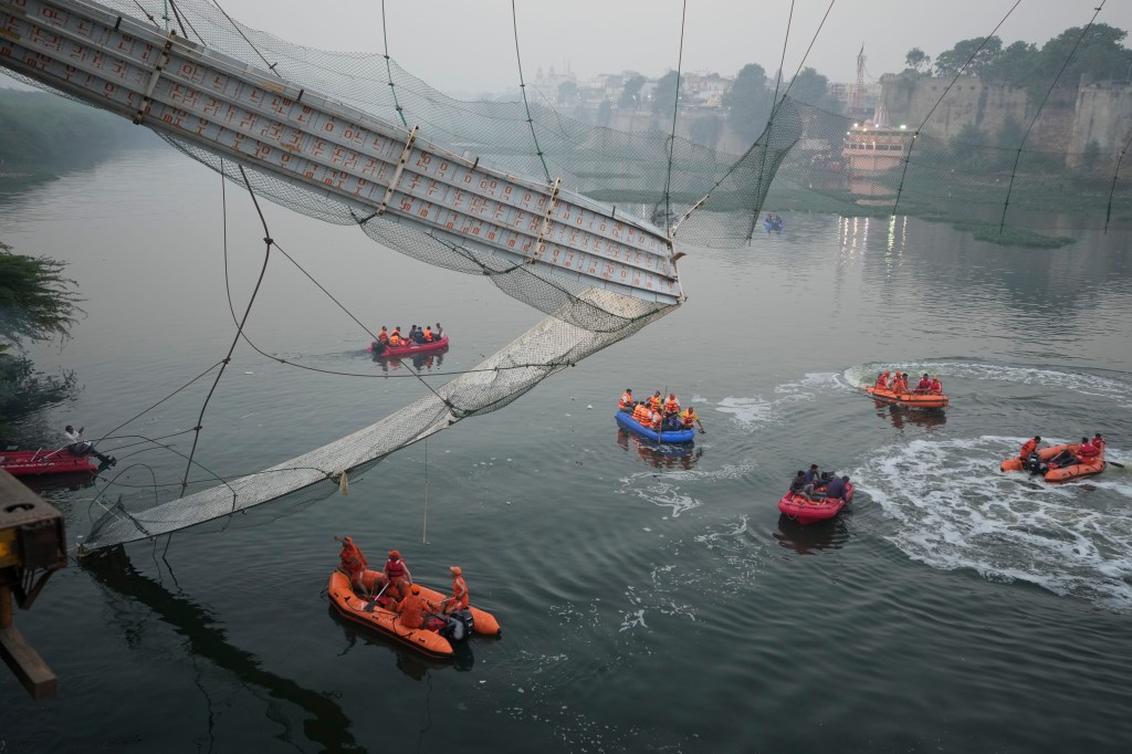 Thumbnail for India footbridge death toll climbs