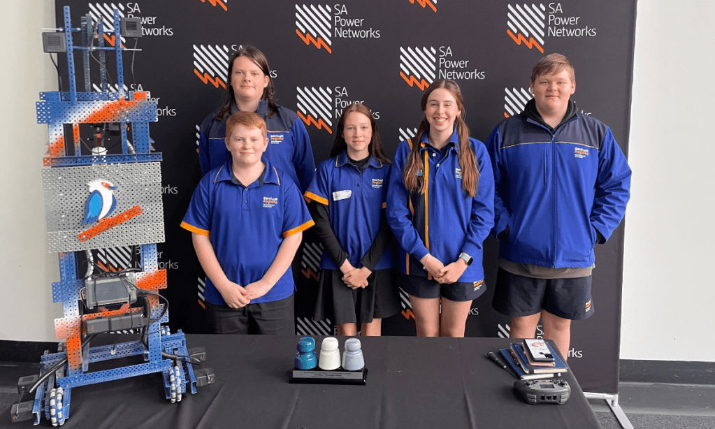 The team from Berri Regional School won the main Innovation Award for their solution. Pictured at the Adelaide Convention Centre with their robot are Berri students Damon Clews (behind), Ethan Baldock, Deni Clark, Kiana Rundell and Josh King. They were accompanied by teacher Tahlia King (not pictured).