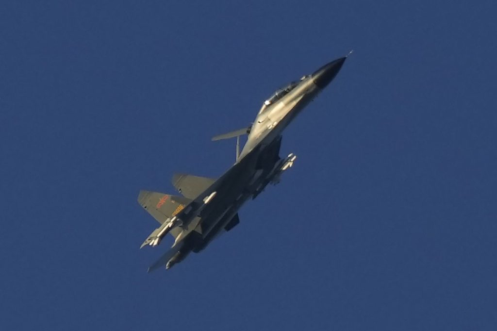 Thumbnail for US says China fighter jet risked collision above South China Sea