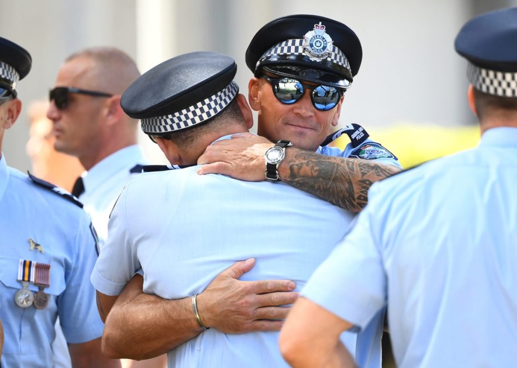 Thumbnail for Thousands attend memorial service for slain police officers