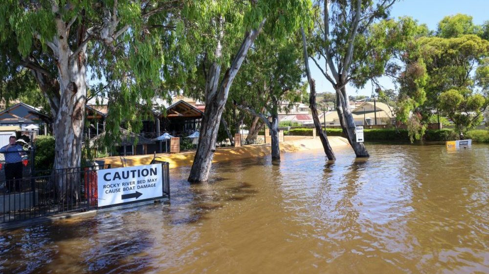 Thumbnail for Fast flowing floodwater rips up roads