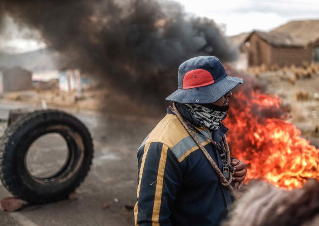 A political protest in Peru. EPA/Aldair Mejia