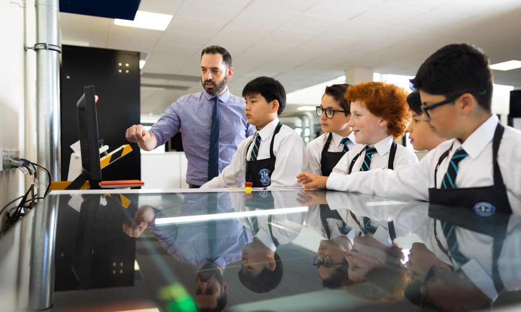Blackfriars Mr Andrew Castiglio, Head of Creative Arts, Design and Technology, with Year 6 students
