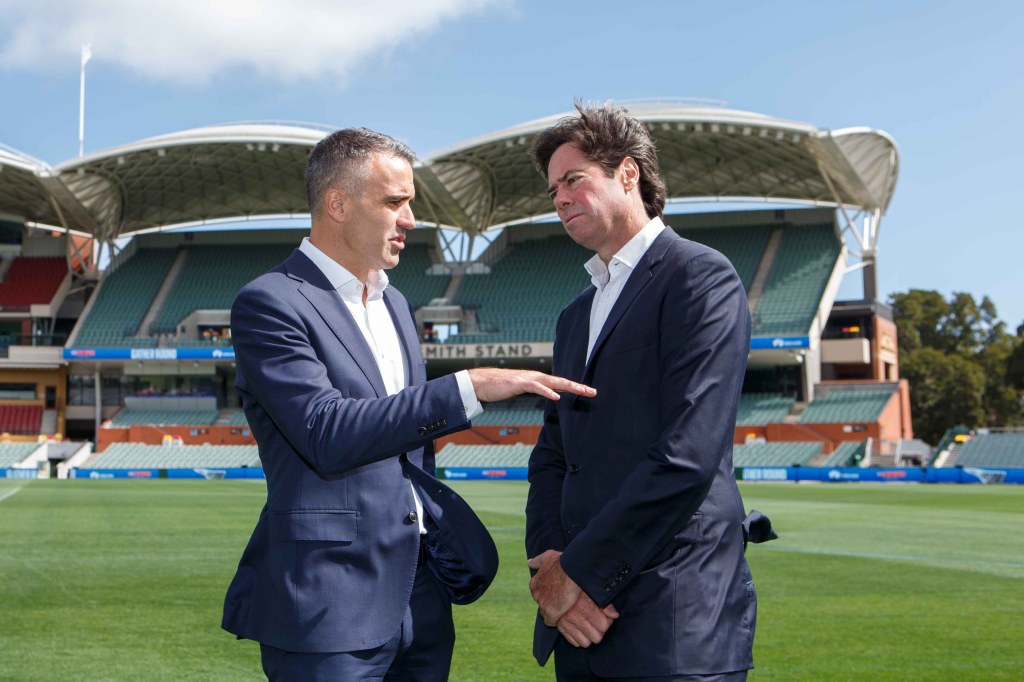 Premier Peter Malinauskas with footy buddy Gil McLachlan. Photo: AAP/Matt Turner