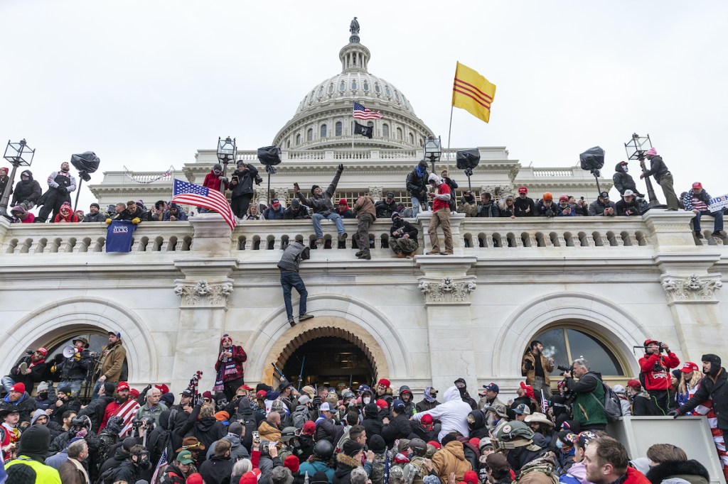 Trump supporters invade the Capitol in an attempt to stop Congress ratifying Joe Biden's win in the 2020 presidential election. Photo: Lev Radin/Sipa USA