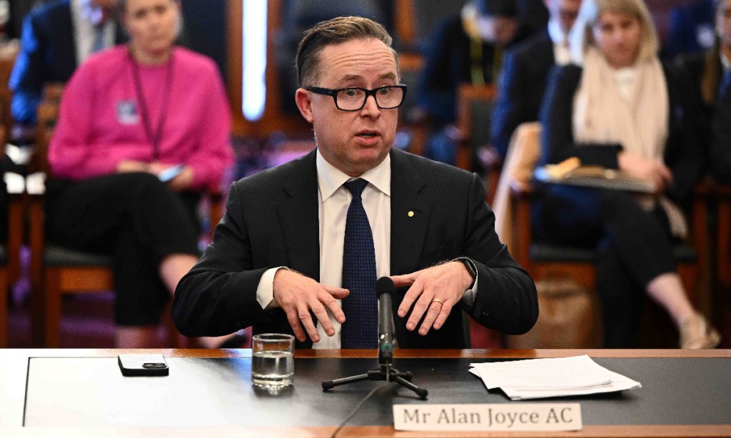 The politics of grievance is on the rise and the behaviour of corporate leaders like Qantas CEO Alan Joyce, pictured at a parliamentary inquiry into the cost of living, isn't helping. Photo: Joel Carrett/AAP