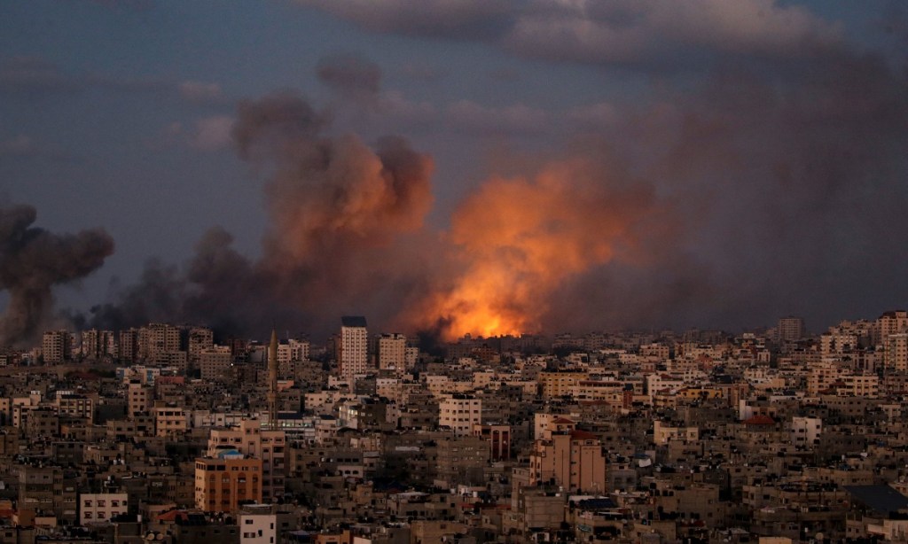 Smoke rises following an Israeli air strike in northern Gaza City, 12 October 2023. Photo: Mohammed Saber/AAP.