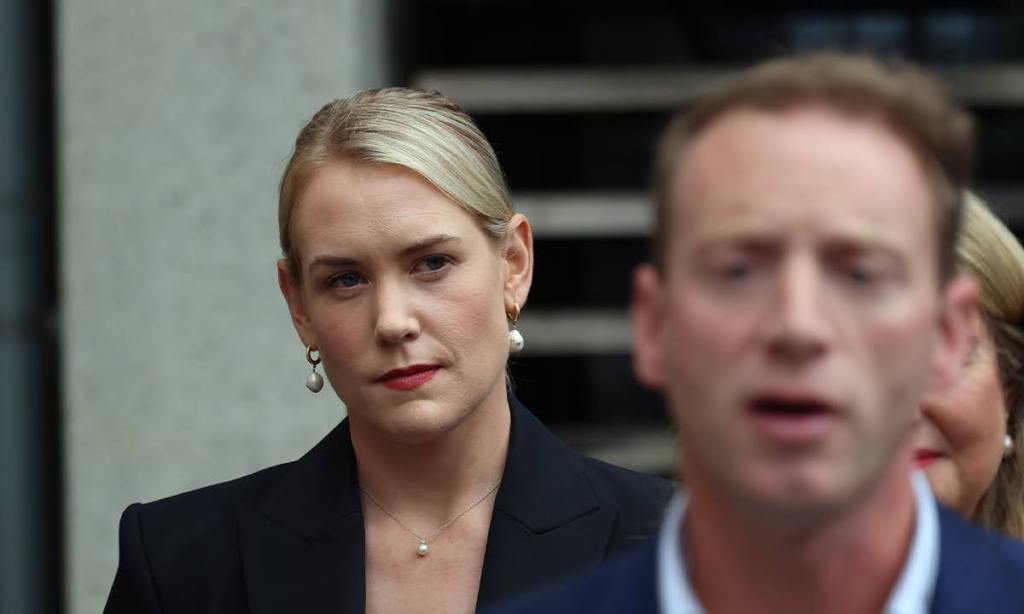 Ashton Hurn looks on as David Speirs addresses a news conference. Photo: Tony Lewis/InDaily