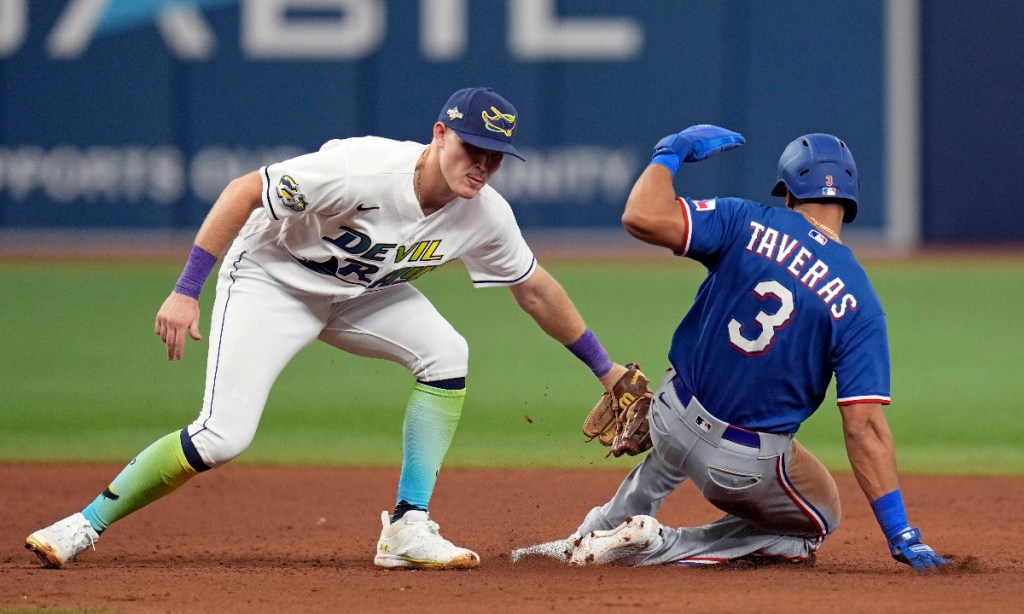 Tampa Bay Rays second baseman Curtis Mead tags out Texas Rangers' Leody Taveras on an attempted steal. Photo: AP/John Raoux