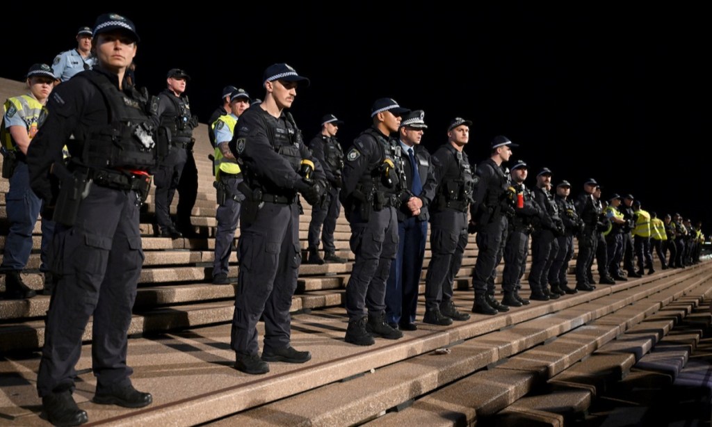 Police at a rally in Sydney. Photo: Dean Lewins/AAP