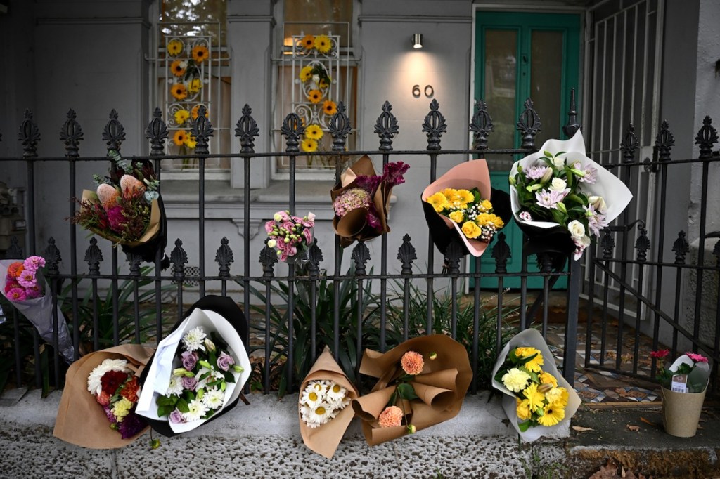 Flowers at the Paddington home where police allege two missing men were murdered. Photo: AAP