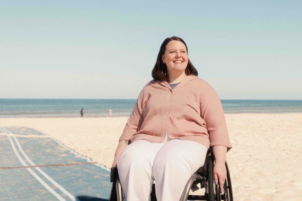 estara client Molly using the Glenelg beach mats
