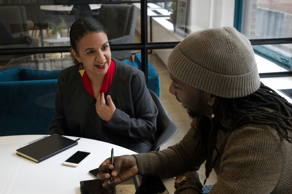 Photo by <a href="https://unsplash.com/@jopwell?utm_content=creditCopyText&utm_medium=referral&utm_source=unsplash">The Jopwell Collection</a> on <a href="https://unsplash.com/photos/a-woman-sitting-at-a-table-talking-to-another-woman-GB4ScXwxNGI?utm_content=creditCopyText&utm_medium=referral&utm_source=unsplash">Unsplash</a>
  
