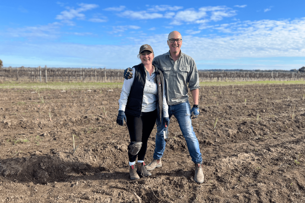 Landowners Tara and Oli Madgett with South Australia's newly planted Agave crop. Photo: supplied
