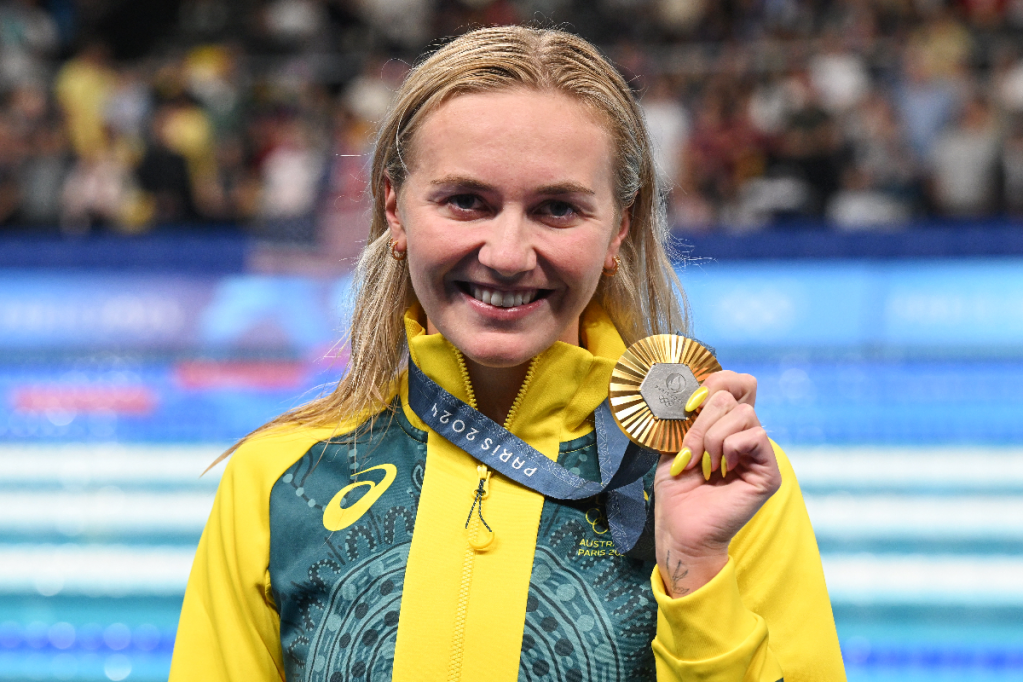 Thumbnail for Ariarne Titmus wins gold to defend Olympic title in ‘race of the century’