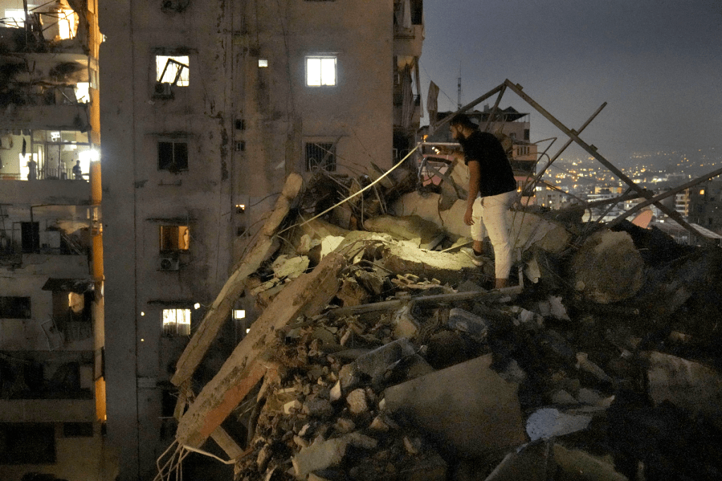 Destroyed and damaged buildings in Beirut after an Israeli airstrike on Tuesday. Photo: AP