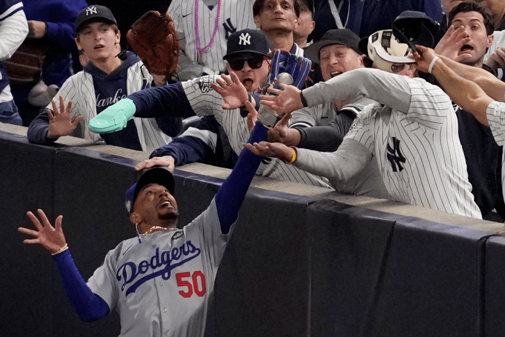 Thumbnail for Yankees fan grabs ball out of fielder’s mitt